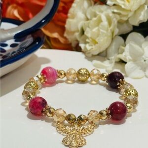 Gold and Pink Beaded Bracelet with Elegant Design